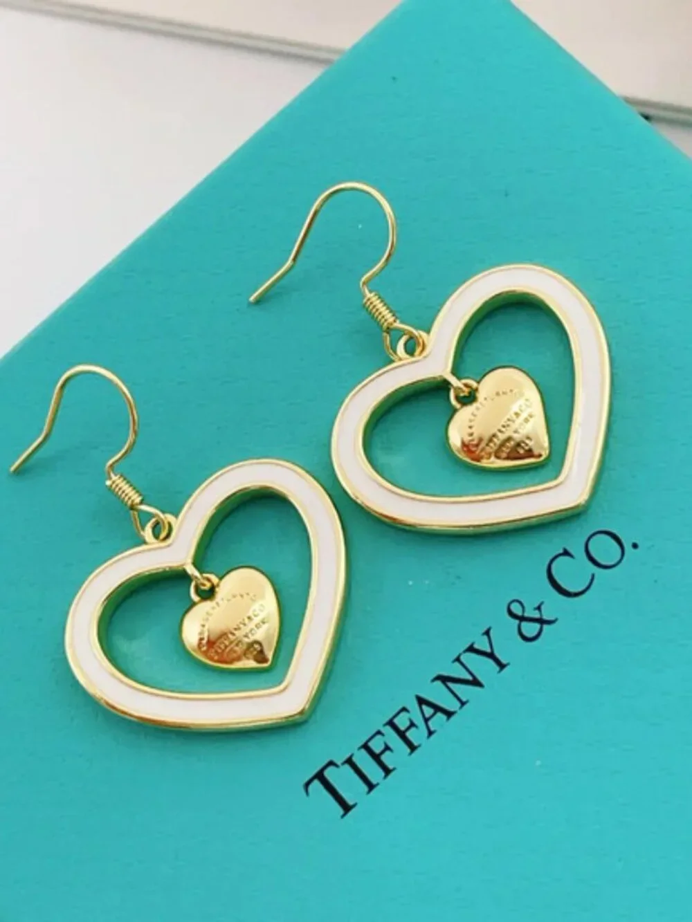 Tiffany & Co. Gold Tassel White Heart Earrings